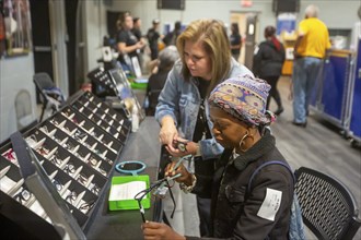 Detroit, Michigan, The OneSight Foundation organized a free clinic that offered eye exams and