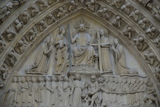 Detail of the main portal of Notre Dame Cathedral, Paris, France, Europe