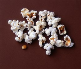 Popcorn spilling out of a bowl