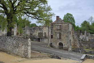 Ruins along the main road The burnt village of Oradour-sur-Glane was destroyed on 10 June 1944 when