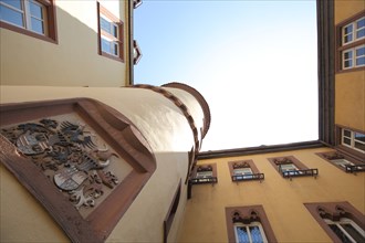 Inner courtyard of the Old Town Hall with perspective and view up to the sky in Wertheim, Tauber,