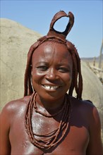 Traditionally dressed Himba woman, Purros Traditional Village, Purros, Kaokoland, Kunene, Namibia,