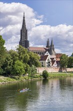 City view, Danube bank with historic old town, fishermen's quarter, cathedral, rowing boat, sports