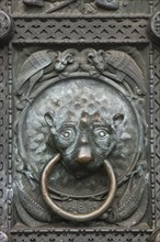 Door puller with lion head at the cathedral gate, St. Petri cathedral, old town, Bremen, door