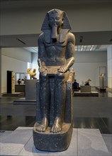 Statue of Pharaoh Ramses II on his throne, 13th century BC, Louvre Abu Dhabi, Saadiyat Island, Abu