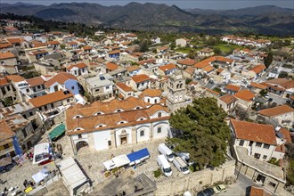 Town view Pano Lefkara with the church Timiou Stavrou seen from the air, Cyprus, Europe