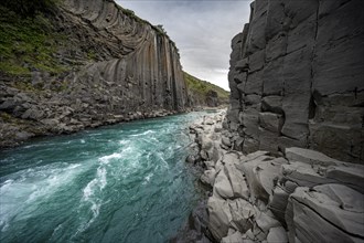 Stuðlagil Canyon, turquoise river between basalt columns, Egilsstadir, Iceland, Europe