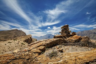 Stone cairn in Spiti Valley in Himalayas, Himachal Pradesh, India, Asia