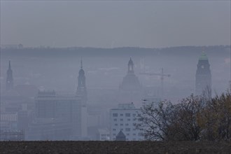 View from Dresden's Südhöhe of the city centre with its towers sinking into the fog