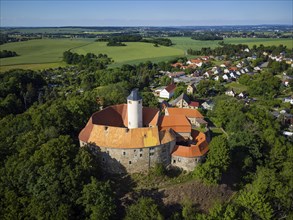 Schönfels Castle with the newly renovated keep (castle tower) . Schönfels Castle is a typical