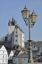 Count's castle built 11th century as landmark with street lamp, Diez, Hesse, Germany, Europe