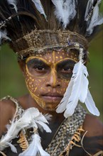 Portrait, young native woman, with face painting and feather headdress, village Mutin, Lake Murray,