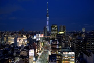 City view with the Skytree, with 634 meters the highest television tower of the earth, blue hour,