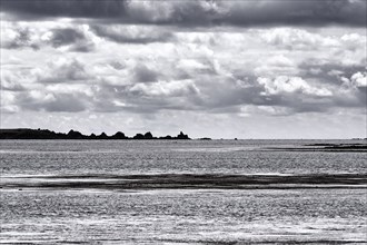 Coastline, rocky islands on the horizon, monochrome, Atlantic Ocean, Isles of Scilly, Cornwall,