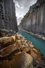 Stuðlagil Canyon, turquoise river between basalt columns, Egilsstadir, Iceland, Europe