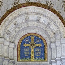 Cross mosaic in the tympanum with the quotation Eine feste Burg ist unser Glauben by Martin Luther,