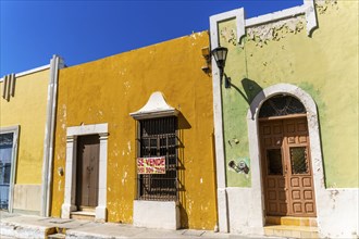 Row of colourful Spanish colonial buildings, Campeche city centre, Campeche State, Mexico, Central