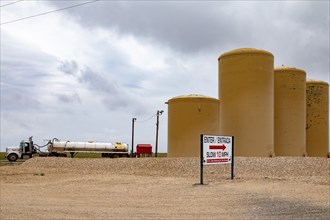 Maljamir, New Mexico, Tanks hold brine water for disposal in the Permian Basin oil fields. The