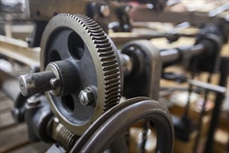 Detroit, Michigan, Detail of a printing press at Amos Kennedy's letterpress printing shop. Kennedy