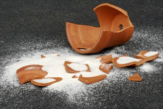 Broken pieces of clay pot and fine sand, clay flower pot