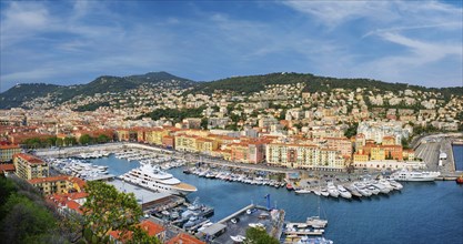 Panorama of Old Port of Nice with luxury yacht boats from Castle Hill, France,