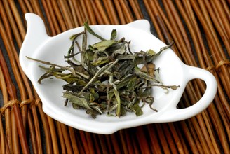 White tea, leaves in bowl, Pai Mu Tan