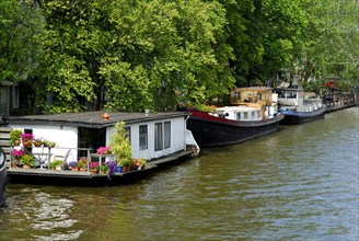 Houseboats on canal, Amsterdam, Netherlands