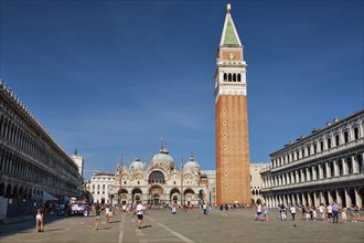 VENICE, ITALY, JULY 19, 2019: St Mark's Basilica and San Marco square with Campanile di San Marco