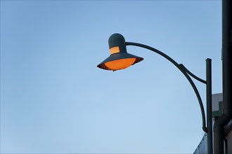 Luminous old street lamp, lantern, orange, light, lighting, historical, dilapidated, symbol