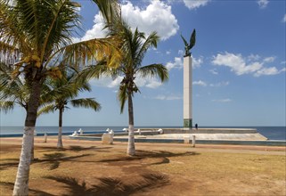 Sculpture of winged Mayan Angel on tall column, the seafront Malecon, Campeche city, Campeche