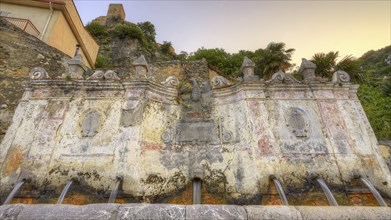 HDR, fountain, super wide angle shot, frontal vou down, morning light, Alcara li Fusi, village,