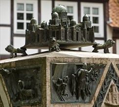 Bronze sculpture with a miniature of the city of Jerusalem on the ashlar of the synagogue memorial,