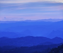 Sunset in mountains in Munnar. Kerala, South India