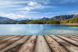 Wooden planks European nature background with lake in Alps, Germany, Europe