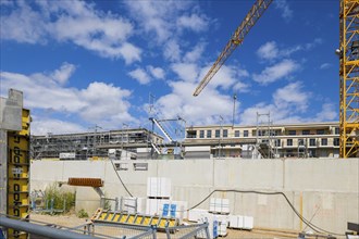 First buildings and construction site of Hafen City Dresden at Neustädter Hafen harbour