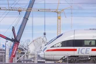 Assembly of the 105-metre-long light ring girder above the north stand of the Heinz Steyer Stadium