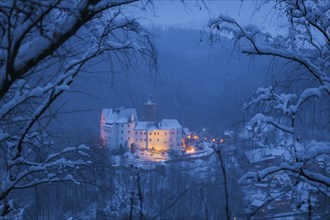 Scharfenstein Castle is a Spornburg on an elongated spur above the village of Scharfenstein