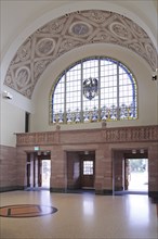 Foyer of the Neo-Renaissance railway station, interior view, glass window, imperial eagle, Bad