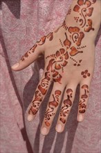 Henna tattoos or mehndi tattoos on a woman's hand, Marrakesh, Marrakesh-Tensift-El Haouz region,