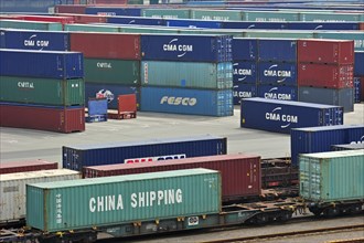 Stacked containers in the container terminal in the port of Zeebrugge, Belgium, Europe