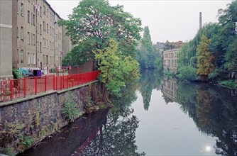 Residential buildings and factory by the river in, Leipzig, 17 October 1992, Saxony, Germany,