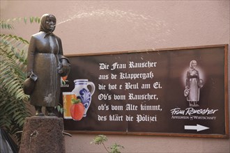 Frau Rauscher fountain as a symbol for cider culture and saying, text, local, sign, Klappergasse,