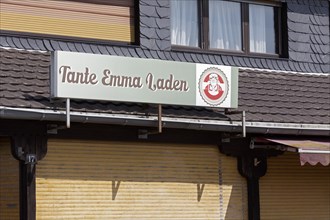 Abandoned grocery shop with sign corner shop, closed shutters, Düsseldorf, North Rhine-Westphalia,