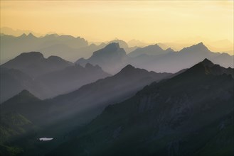 The Appenzell Alps at dusk, with the Central Swiss Alps in the background