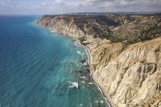 Beach on the cliffs of Cape Aspro near Pissouri seen from the air, Cyprus, Europe