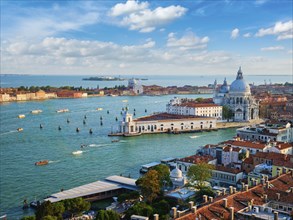 View of Venice lagoon and Santa Maria della Salute church on summer day. Venice, Italy, Europe