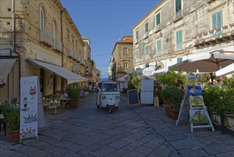 Medieval old town of Tropea with Piaggio Calessino Ape tricycle, Tropea, Vibo Valentia, Calabria,