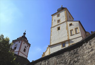 Part of the Seinsheim castle and the tower of the church of St. Nikolai, Marktbreit town, Litzingen