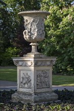 Stone vase with antique decoration on a pedestal, Royal Botanic Gardens (Kew Gardens), UNESCO World