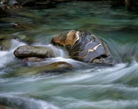 Stones in mountain stream, Alps, Verzasca Valley, Switzerland, Europe